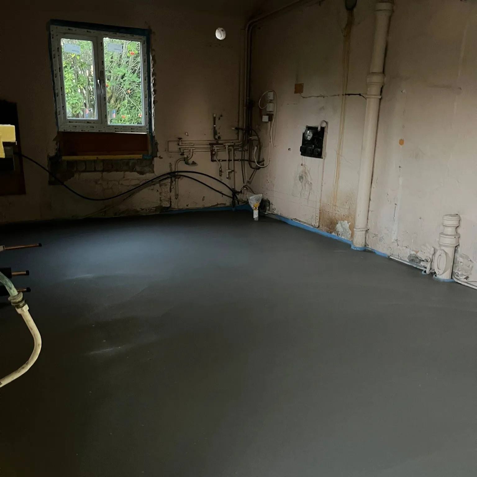 PW-11-underfloor-heating-installation-perth-c Insulation batten system being fitted, Perth home