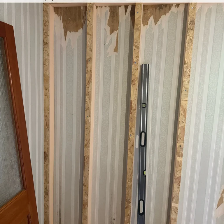 Internal wall insulation boards being fitted to battens, Perth home